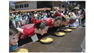 People participating in the pie eating contest